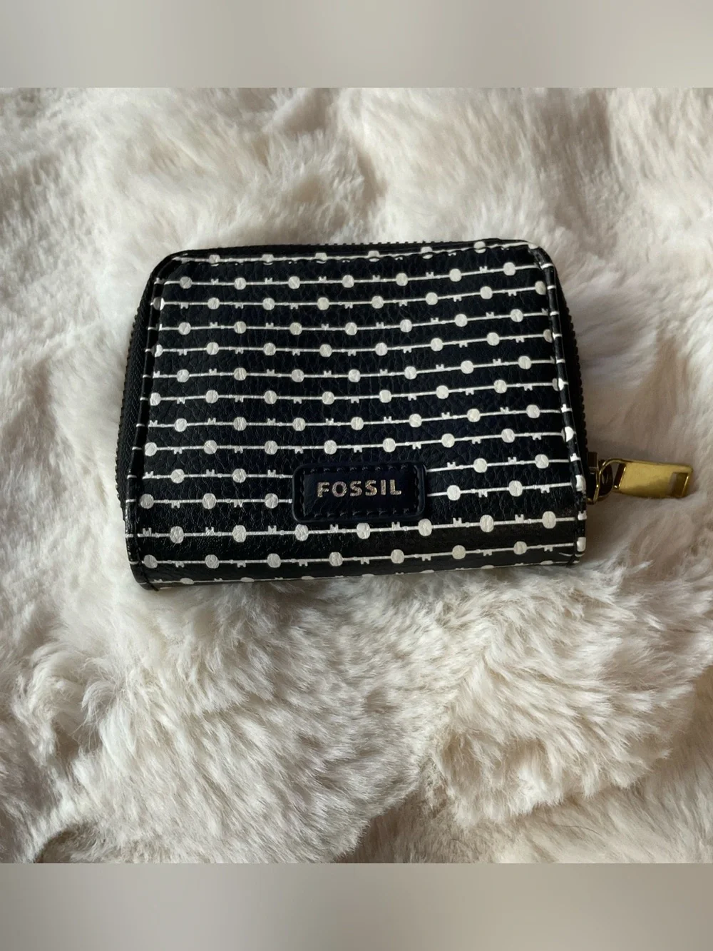 Fossil Logan zip-around bifold wallet, black & white dotted lines, gold hardware